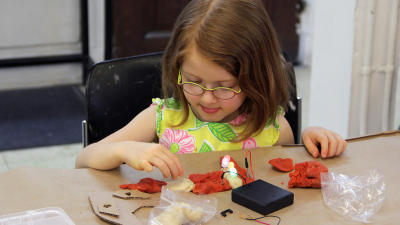 Exploring electrical circuits with Squishy Circuits.