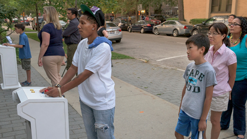 Participants playing art games at the Street Arcade, Sept 2015 (photo courtesy Robert Banke).